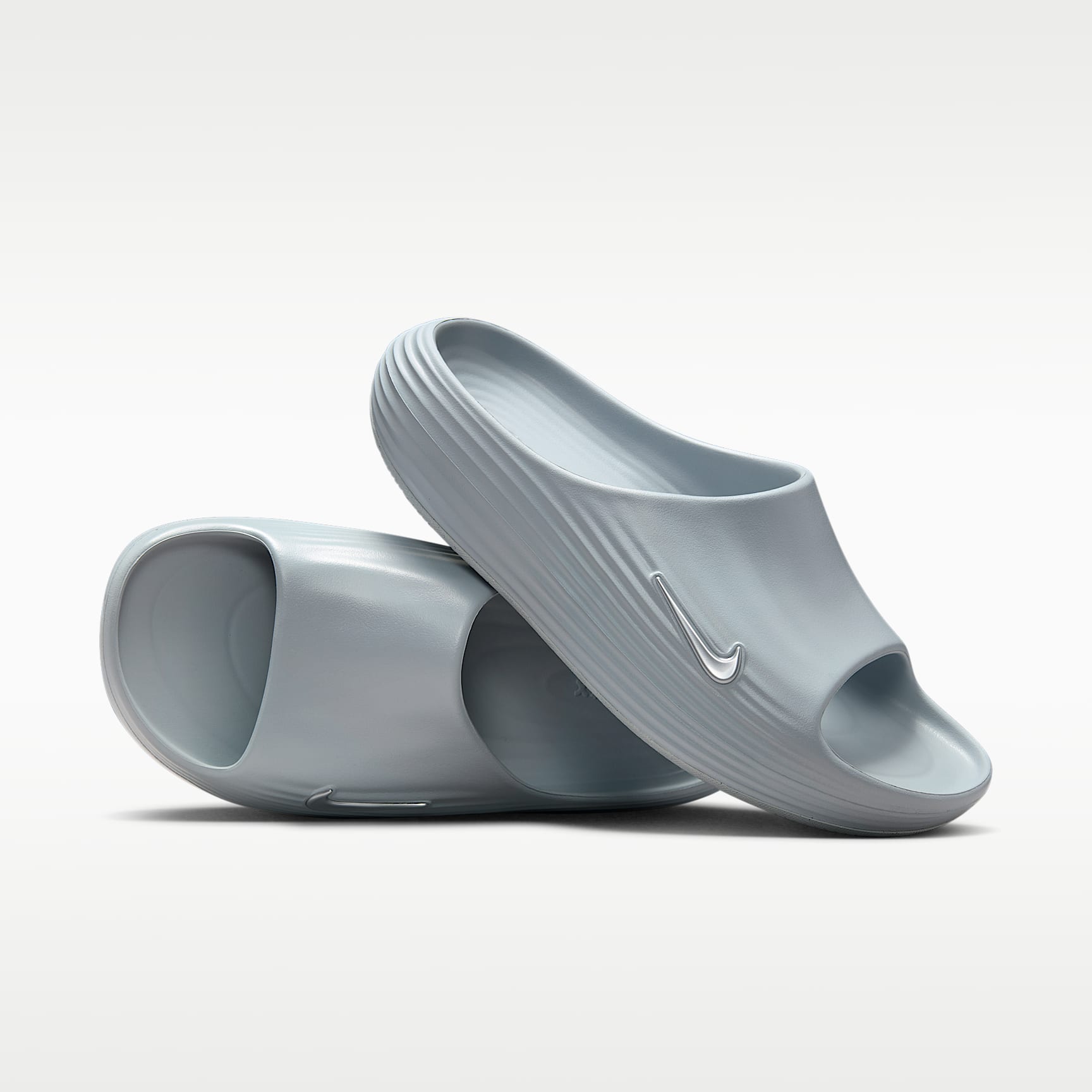 Nike ReactX Rejuven8 Men's Slides. Nike.com